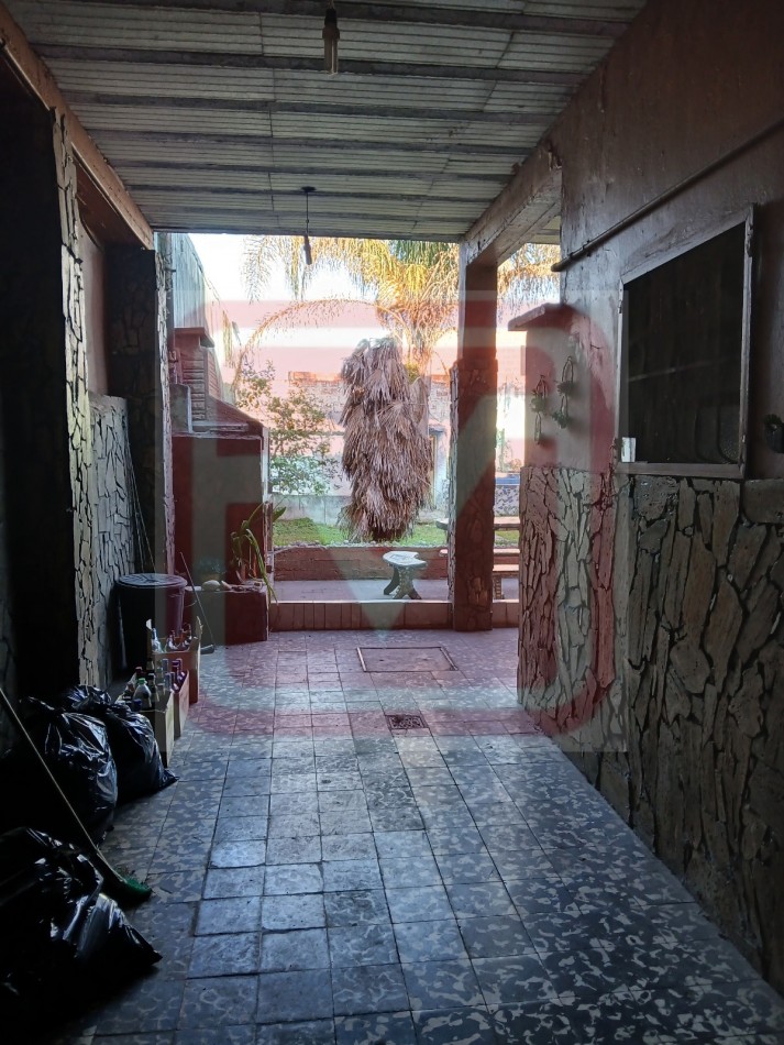 Vivienda multifamiliar en dos plantas. Caupolican 5542. Isidro Casanova. 