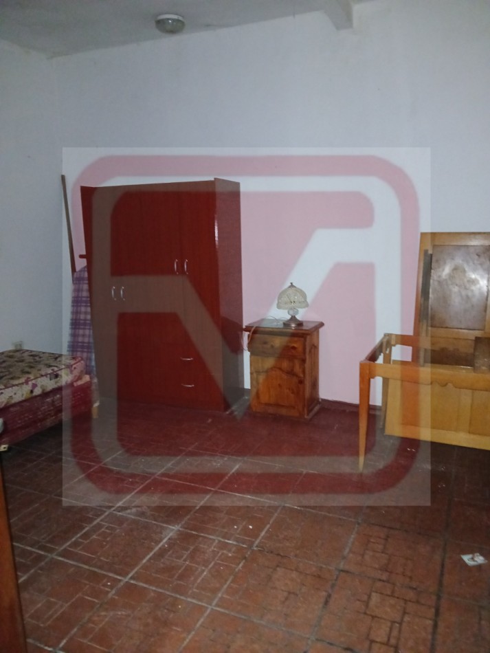 Vivienda multifamiliar en dos plantas. Caupolican 5542. Isidro Casanova. 